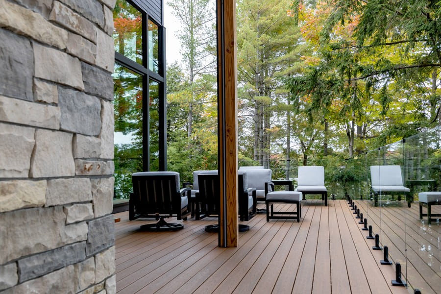 Side Stone View with Side Deck View on Six Mile Lake | Ballantyne Builds