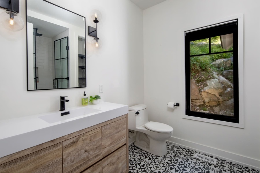 bathroom, white walls, custom vanity with storage and window | Ballantyne Builds