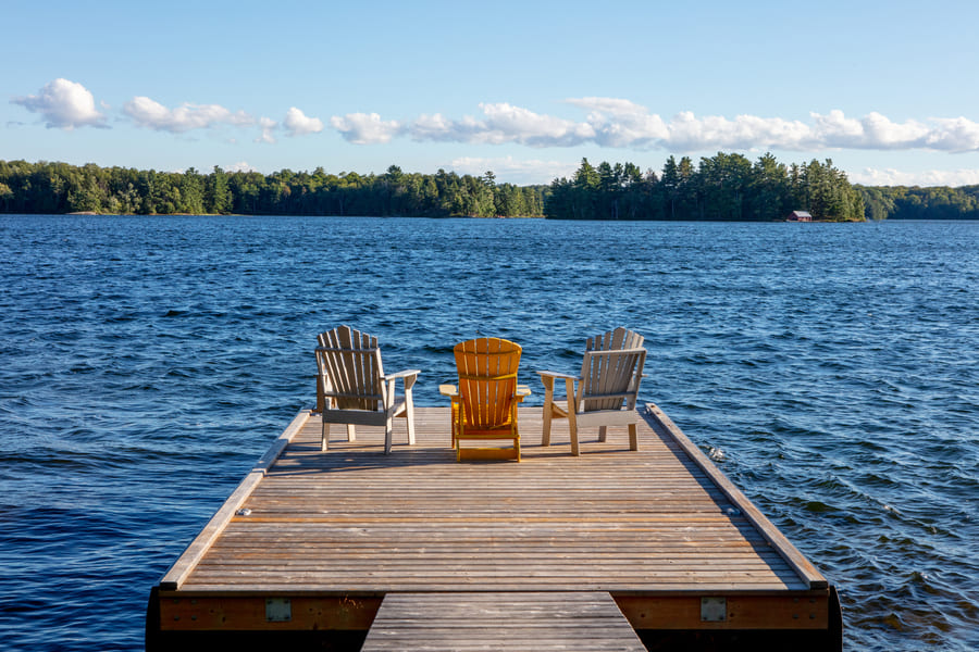 Cottage dock, with seating and boating dock | Ballantyne Builds
