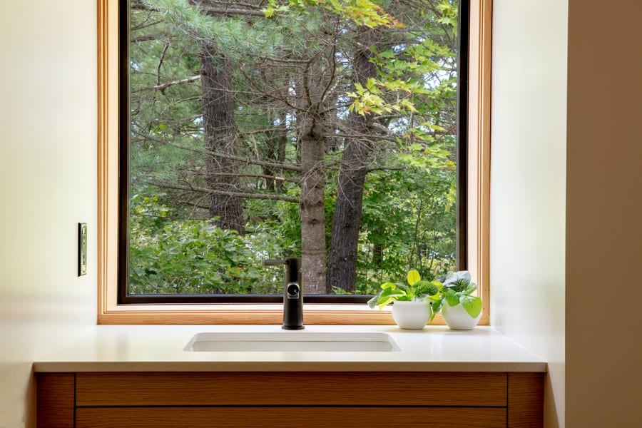 bathroom vanity wth window custom storage and wood work | Ballantyne Builds