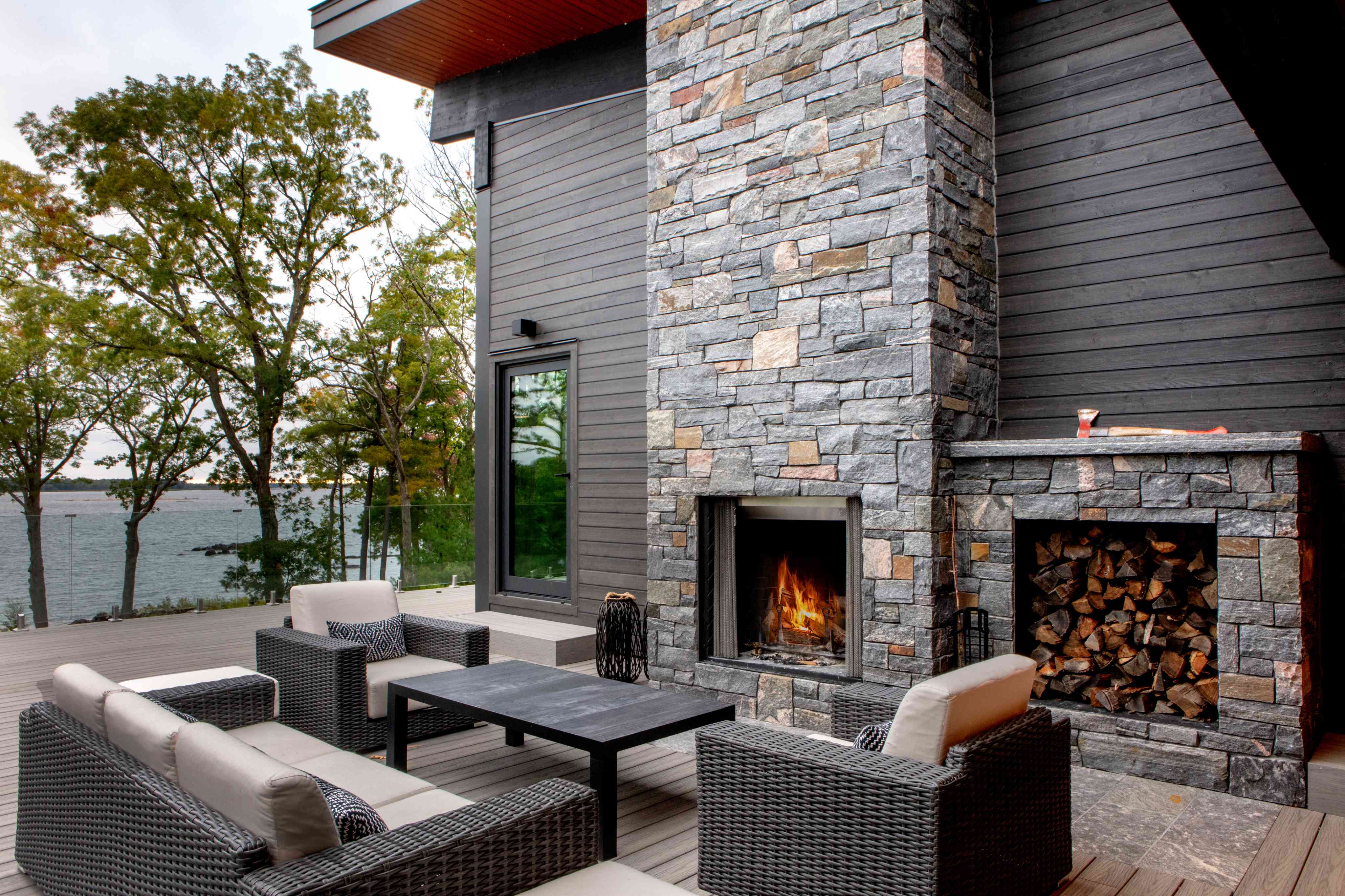 Outdoor space with fireplace | Ballantyne Builds